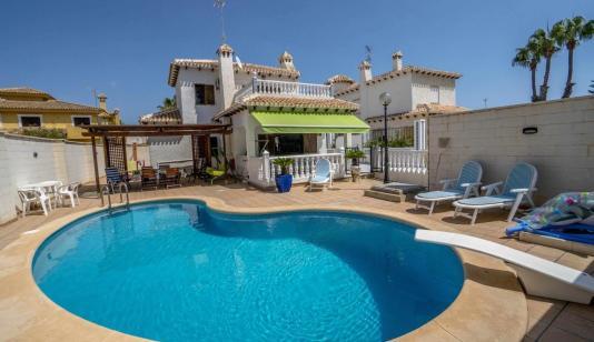 Orihuela Costa, Spain. Real Estate. La Zenia area, 4 bedrooms, 170 m² image 0